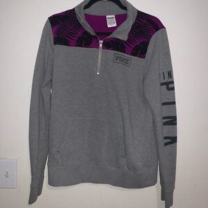 Pink quarter-zip sweater